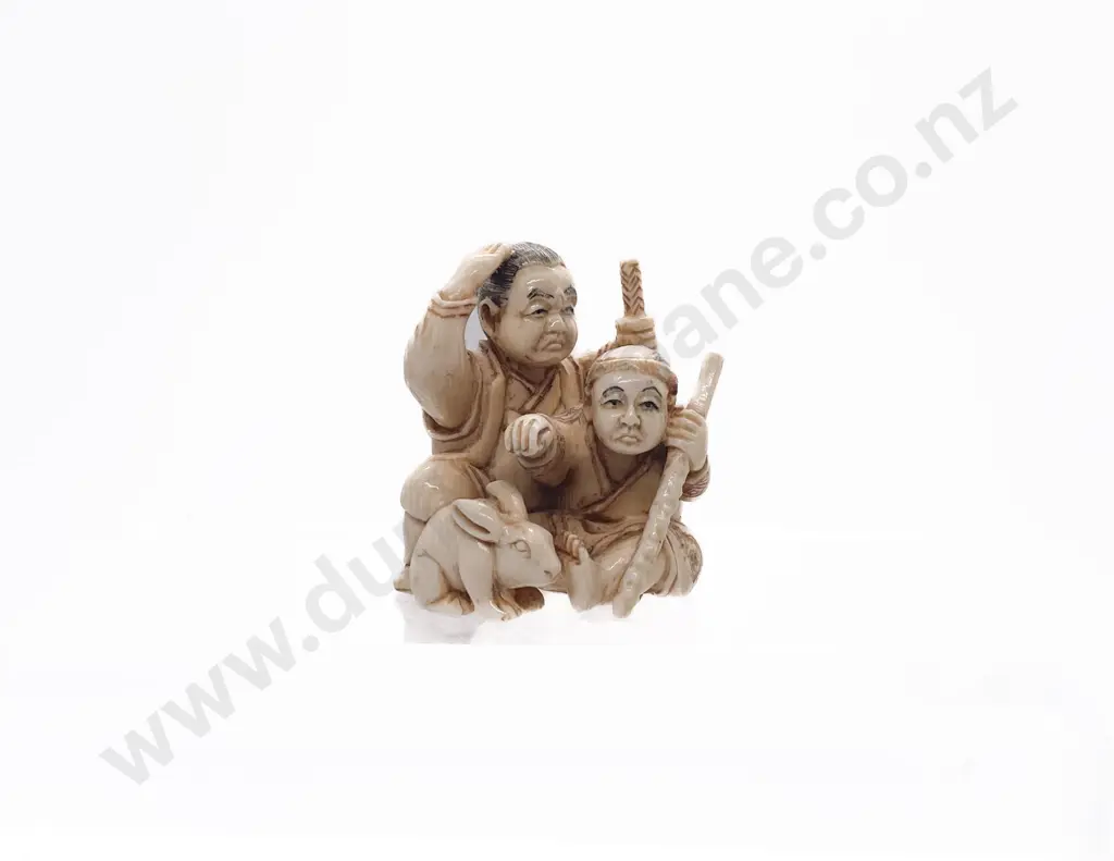 Signed and Stained Ivory Netsuke of a Old Samurai Seated with Apprentice and Rabbit Image 1++