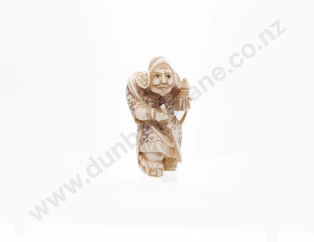 Signed and Stained Ivory Okimono of a Warrior with Sword and Holding a Lantern Image 1++