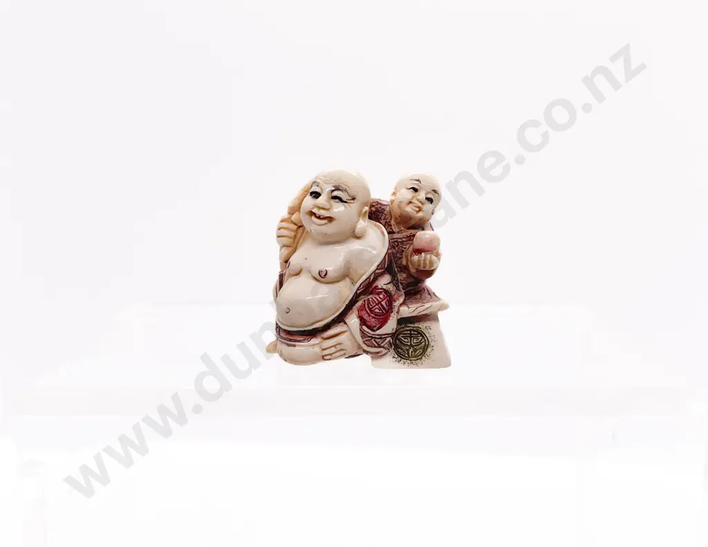 Stained Ivory Netsuke of Hotei with Child Attendant Image 1++
