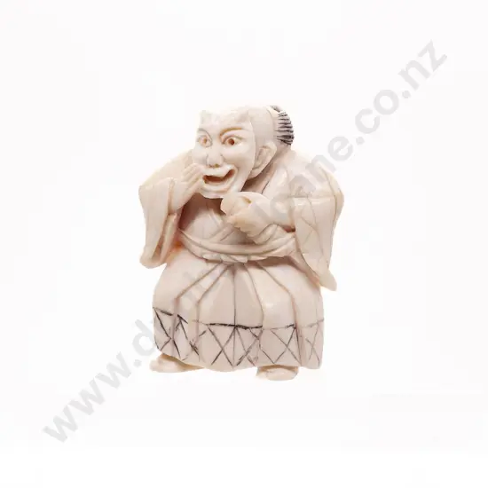 Ivory Netsuke of a Actor Wearing a Demon Noh Mask
