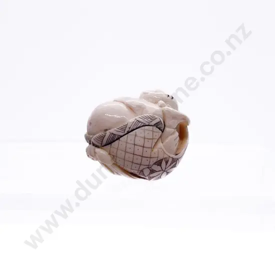 Small Stained Ivory Netsuke of a Tumbling Hotei
