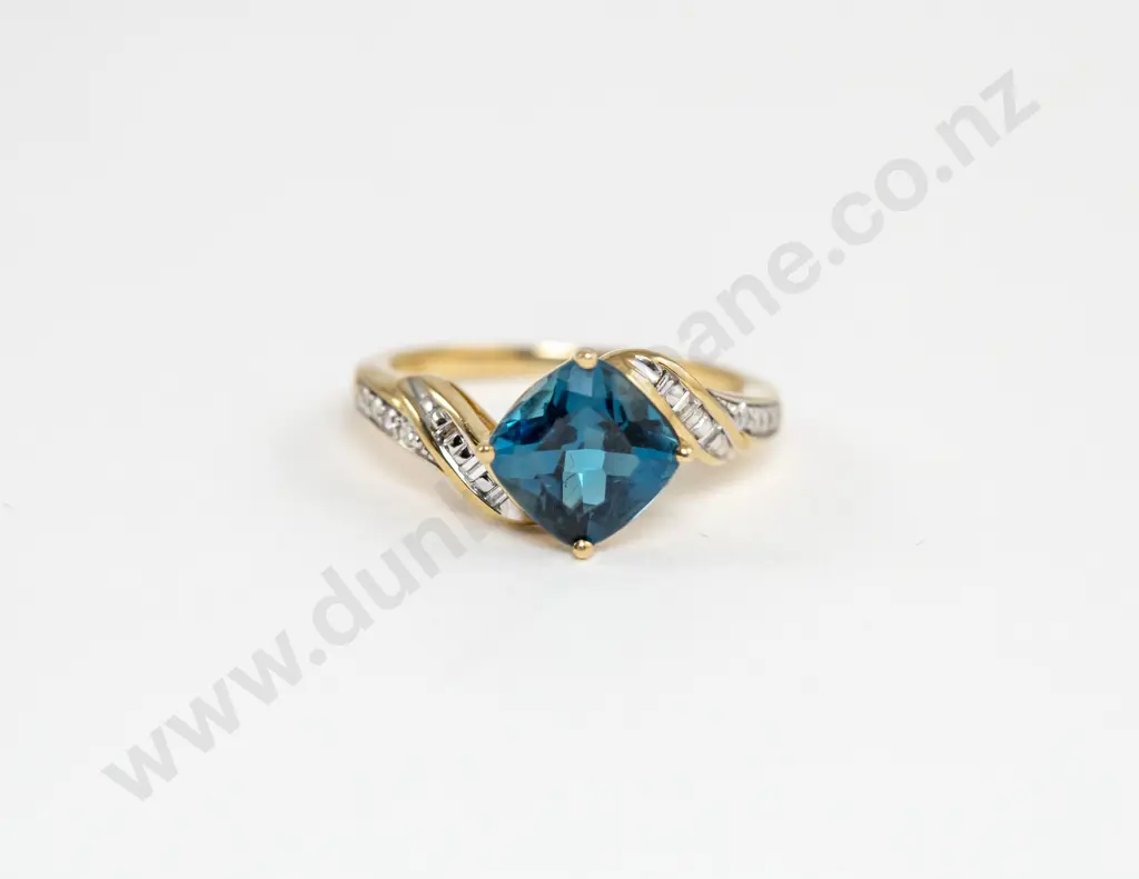 9ct Blue Topaz and Diamond Dress Ring Image 1++