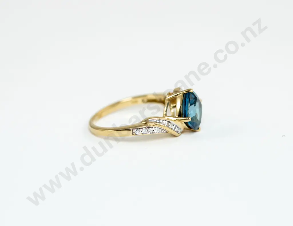 9ct Blue Topaz and Diamond Dress Ring Image 1++