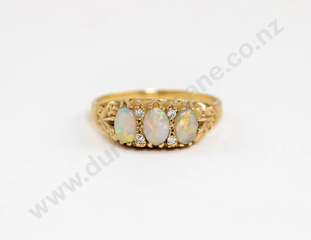 9ct Seven Stone Opal and Diamond Dress Ring Image 1++