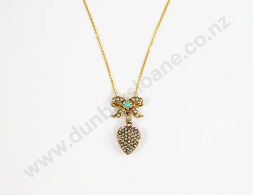 Edwardian 9ct Seed Pearl and Single Turquoise Heart-Bow Pendant Image 1++