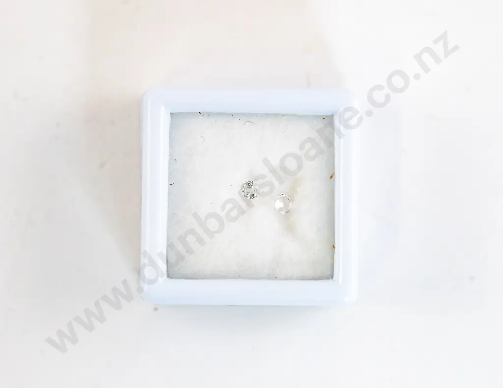 Two Unmounted Diamonds Image 1++