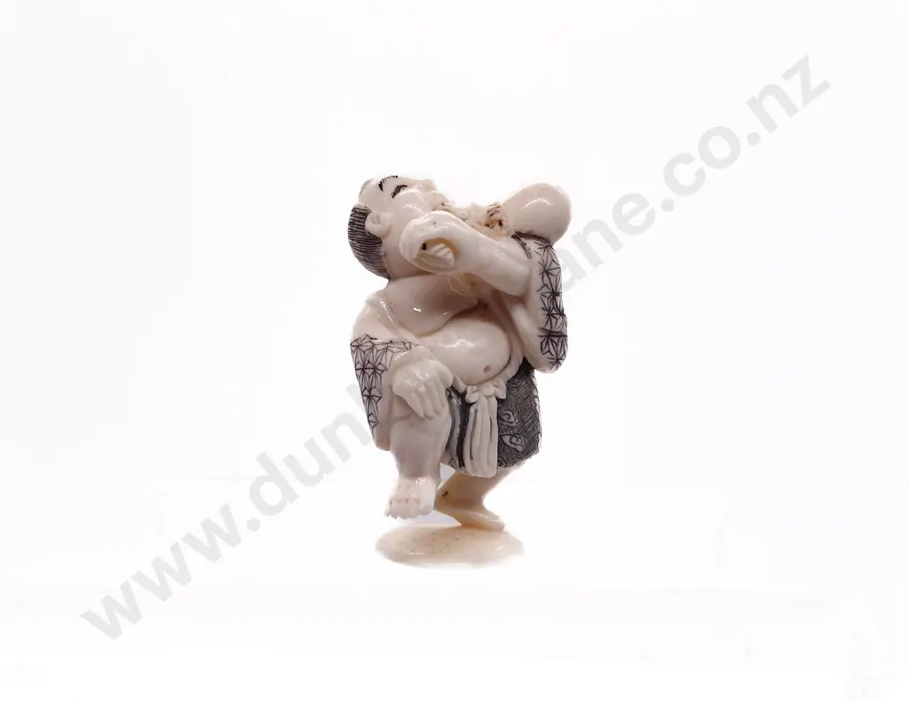 Signed and Stained Ivory Netsuke of a Man Drinking Water from a Gourd Image 1++