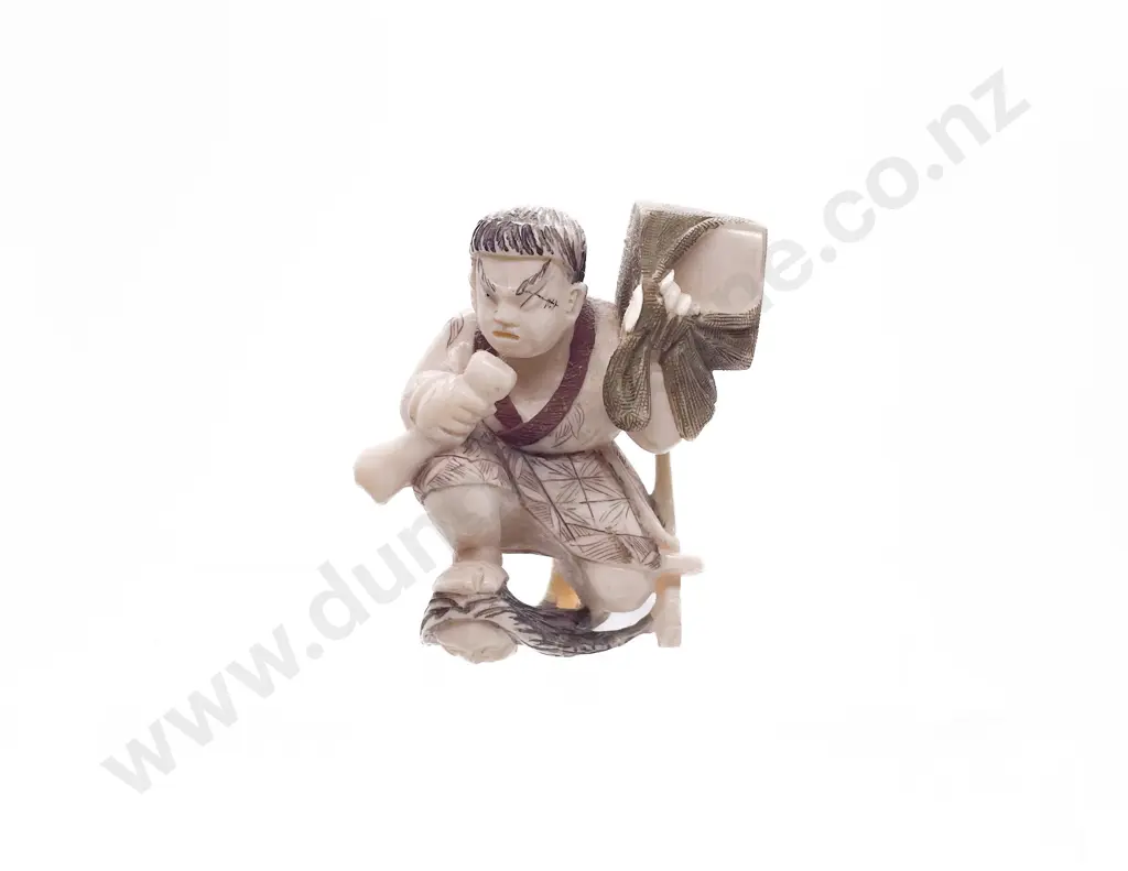 Signed and Stained Ivory Netsuke of a Demon Queller Carrying Box on His Back Image 1++