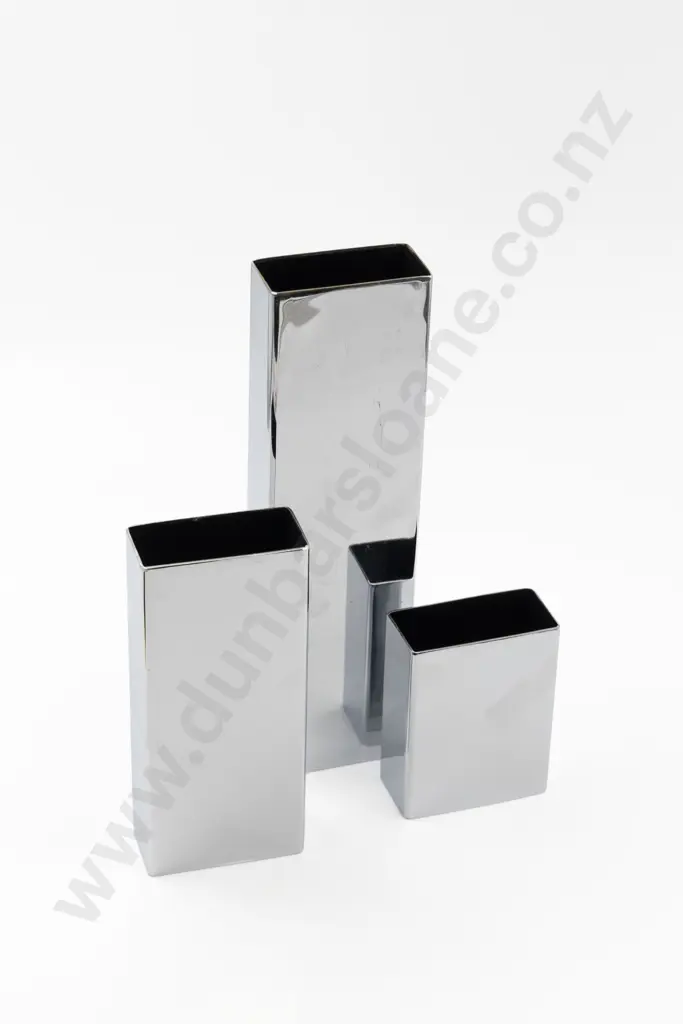 Set Of Three Japanese Mid-Century Graduated Chrome Plated Skyscraper Vases Image 1++