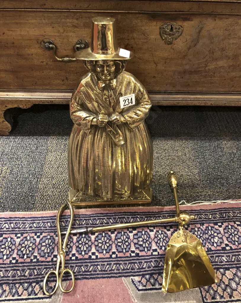 Brass Figural Fire Tidy Image 1++
