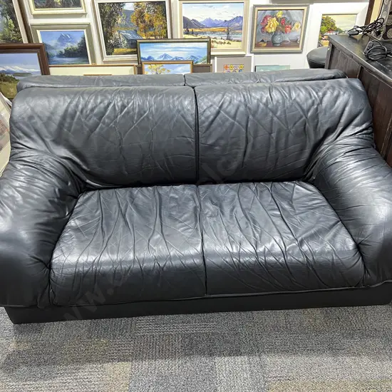 Pair of Sloping Arm Leather Sofas