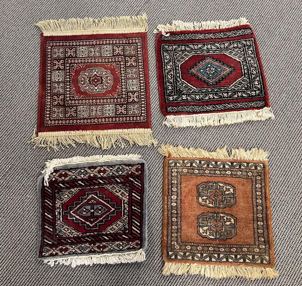Four Assorted Small Persian Mats Image 1++