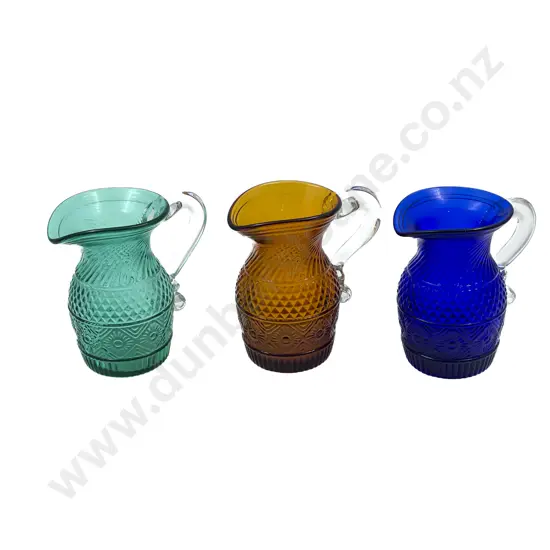 Three Pressed Glass Jugs