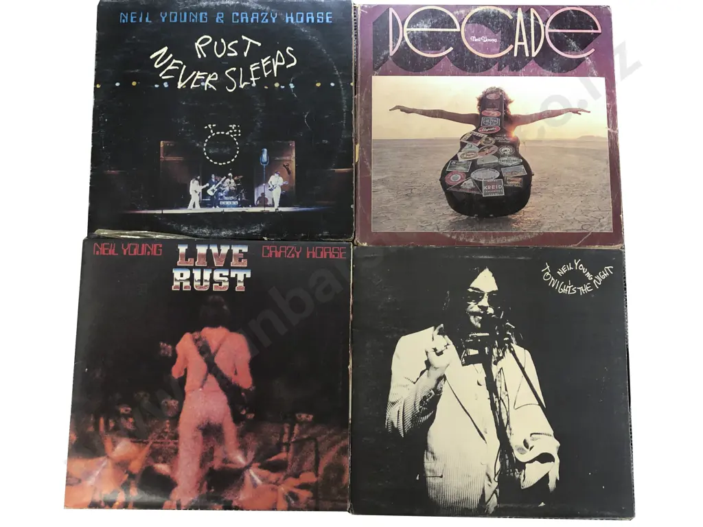 Four Assorted Neil Young Records Image 1++