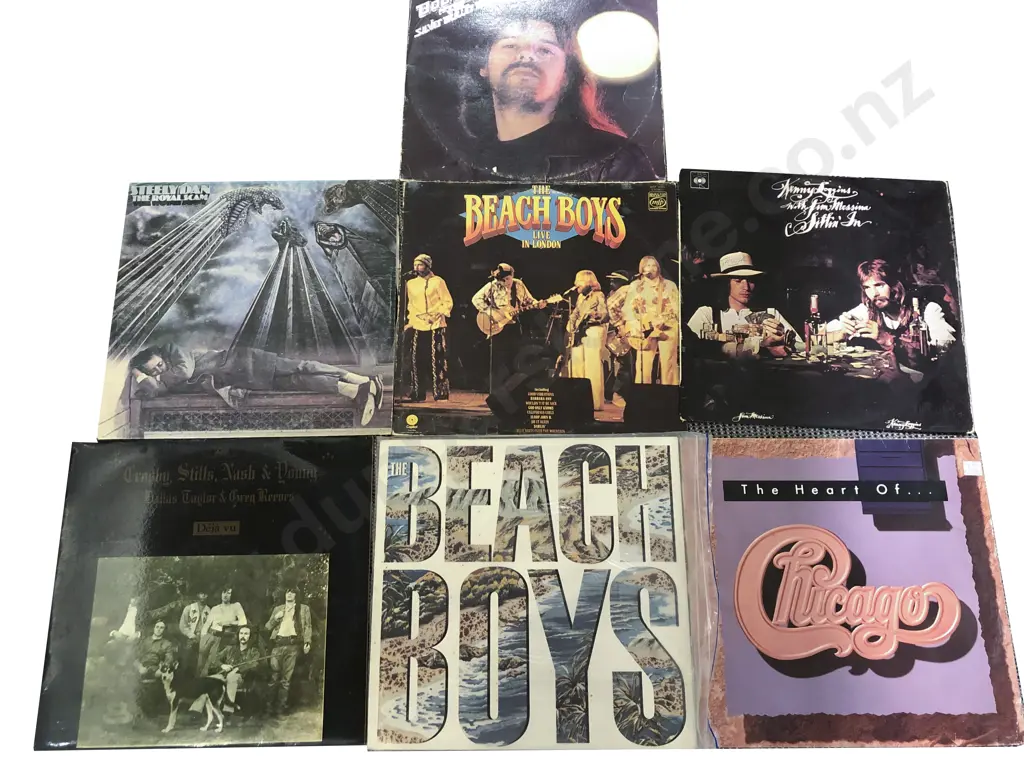 Seven Assorted Vinyl Records Including The Beach Boys Image 1++
