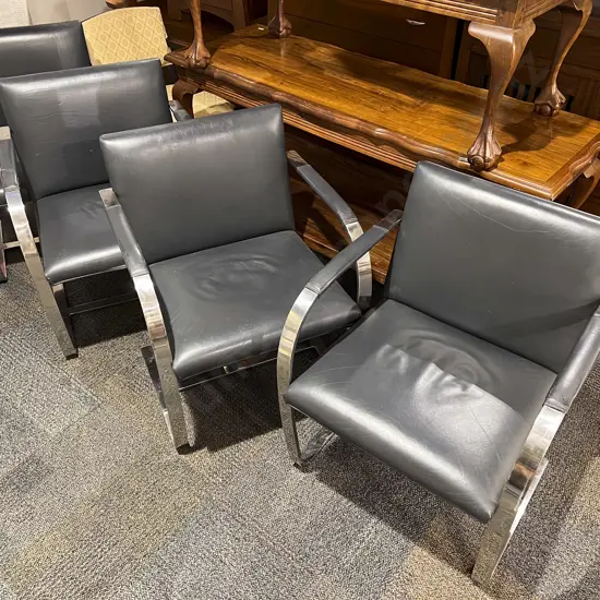Four Mid Century Leather & Chrome Cantilever Armchairs