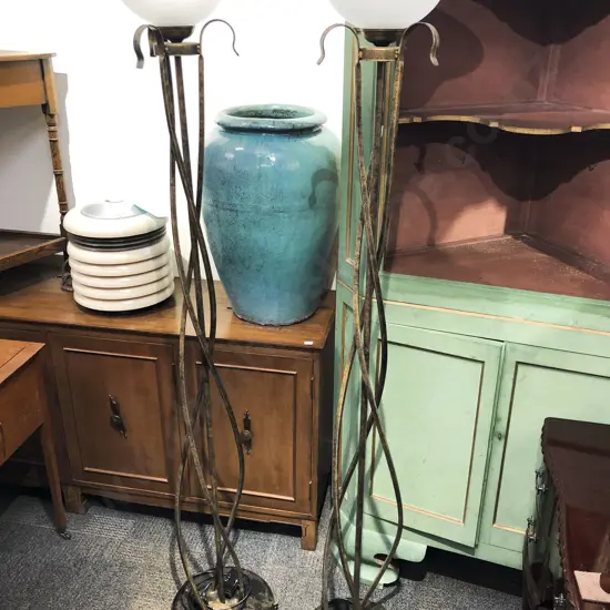 A Pair of Decorative Wrought Metal Tall Uplights