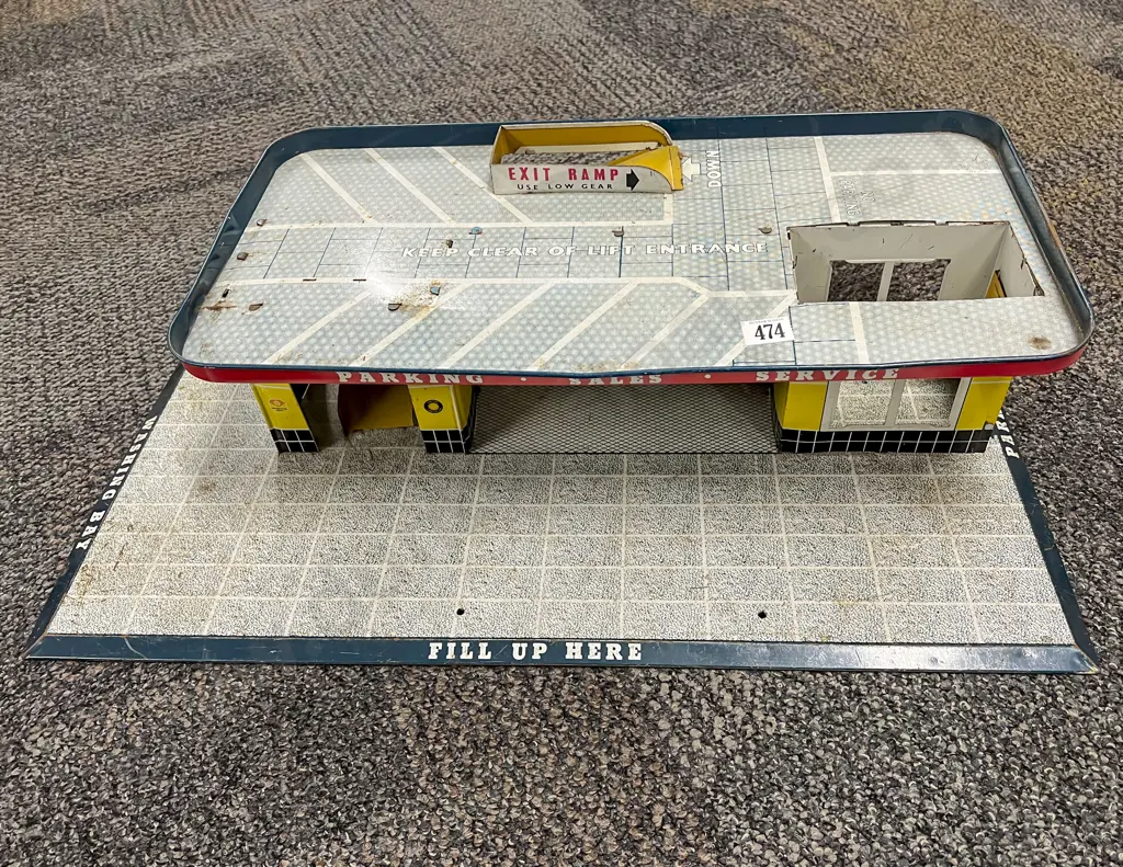 Tinplate Diecast Vehicle Garage with assorted toys including toy cash register Image 1++