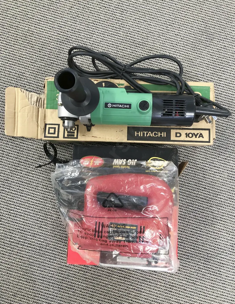 Boxed Hitachi Angle Drill with Boxed Jigsaw Image 1++