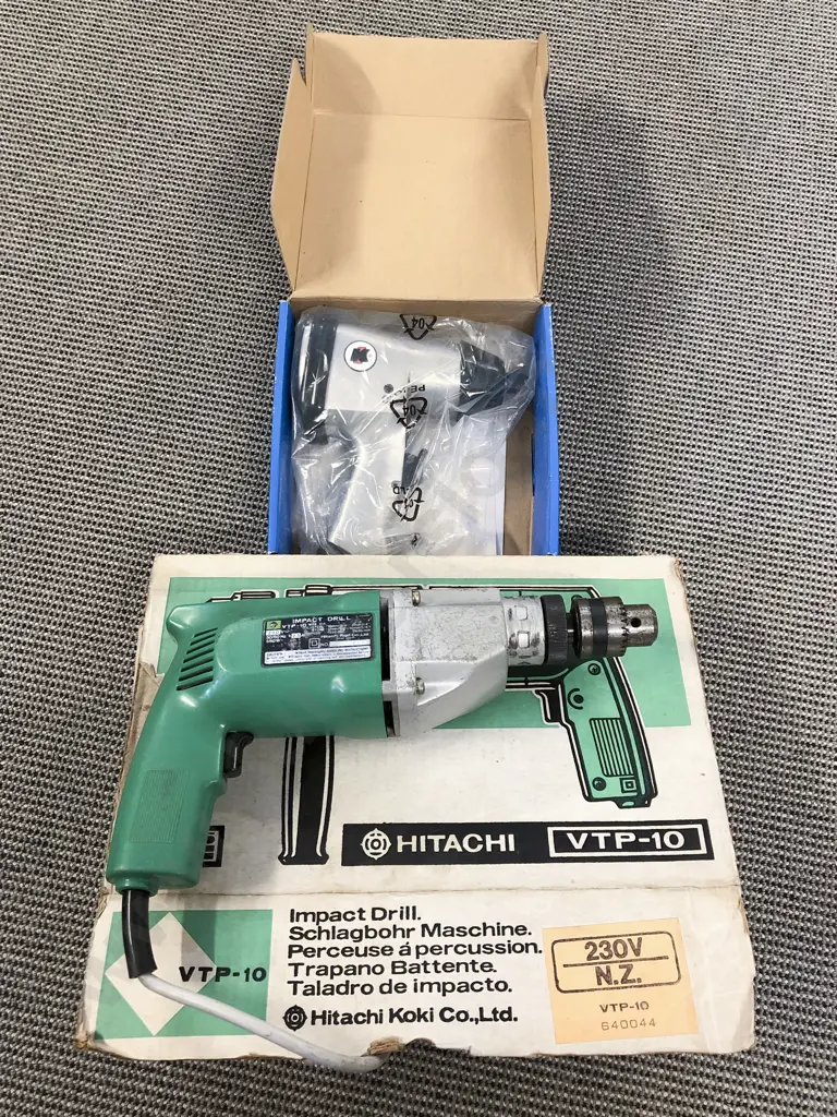 Boxed Hitachi Impact Drill with Boxed Impact Wrench Image 1++
