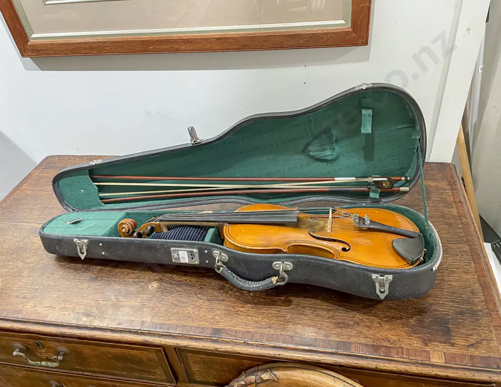 Violin in Case together with Two Bows Image 1++