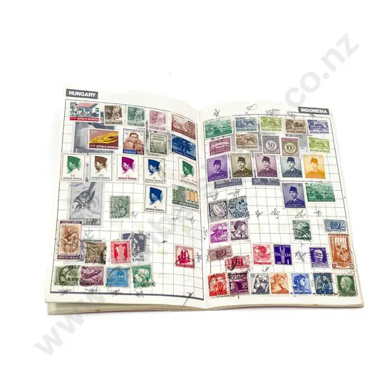 Five Vintage World Stamps Albums with Man in Flight Tokens and Various