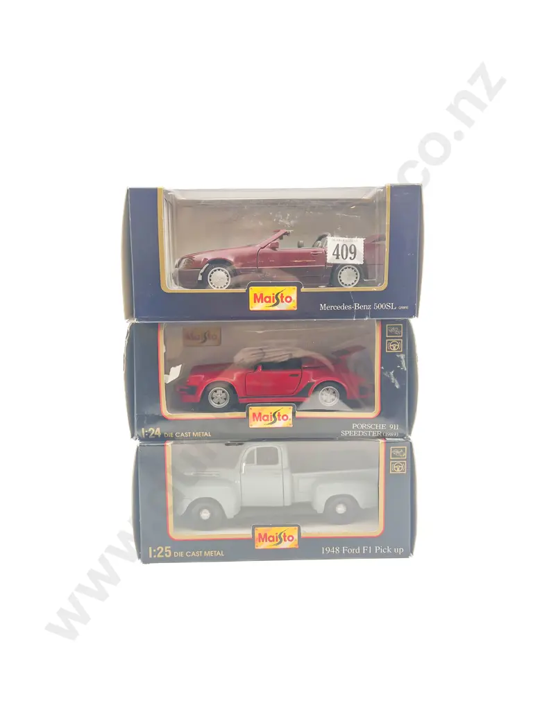 Three Maisto 1-24 Scale Models Image 1++