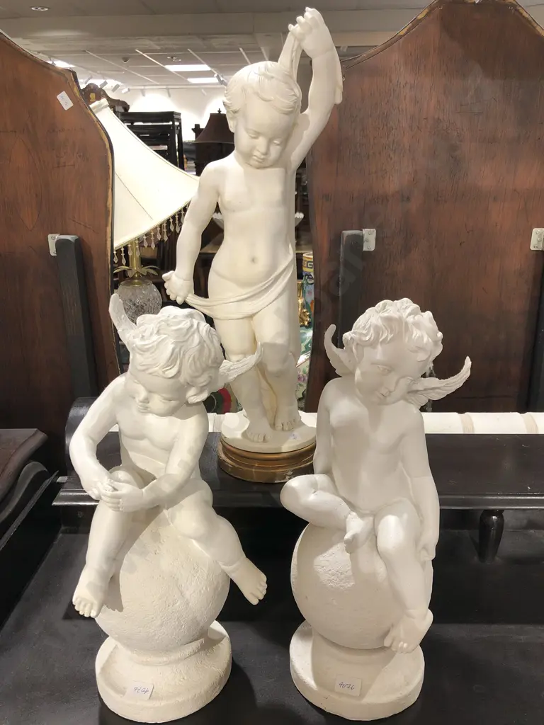 Three Assorted Resin Cherub Ornaments Image 1++