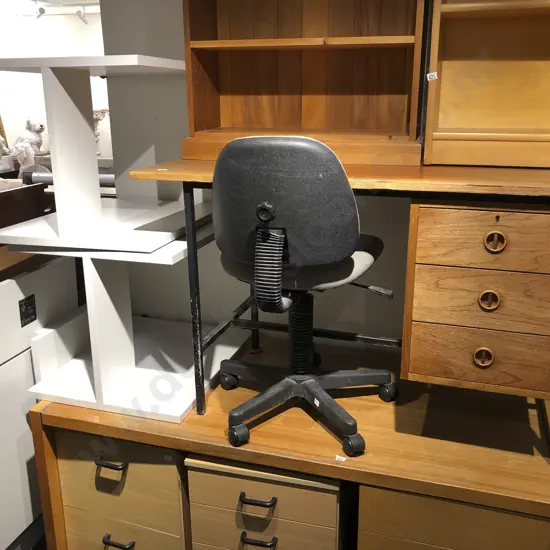 Office Desk Together with Other Unassembled Desk and Office Chair