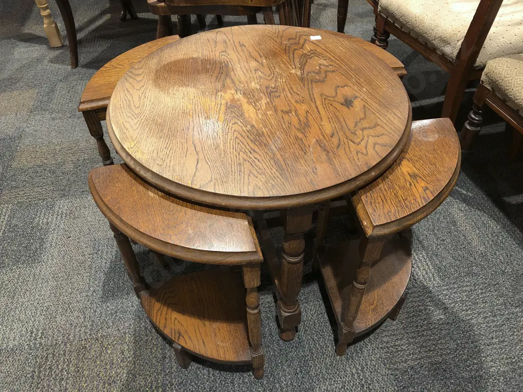 Circular Oak Coffee Table with Four Nesting Stools Image 1++
