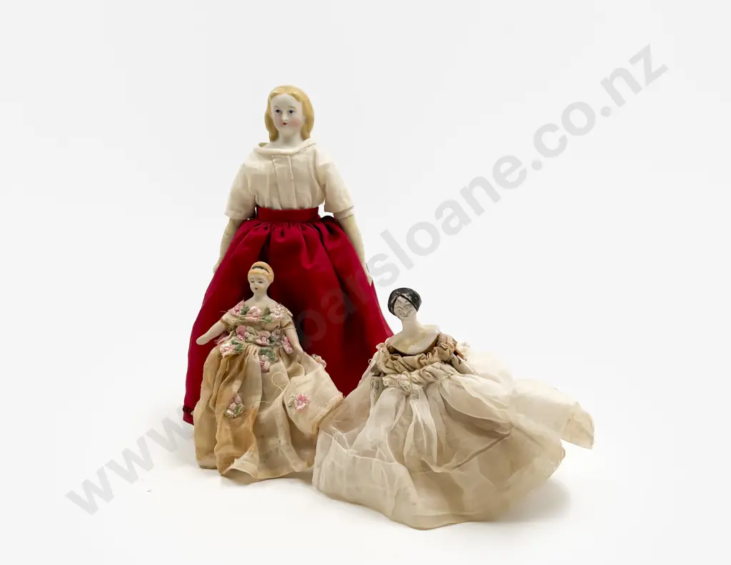 Two Small German China Head Dolls and Wooden Doll Image 1++
