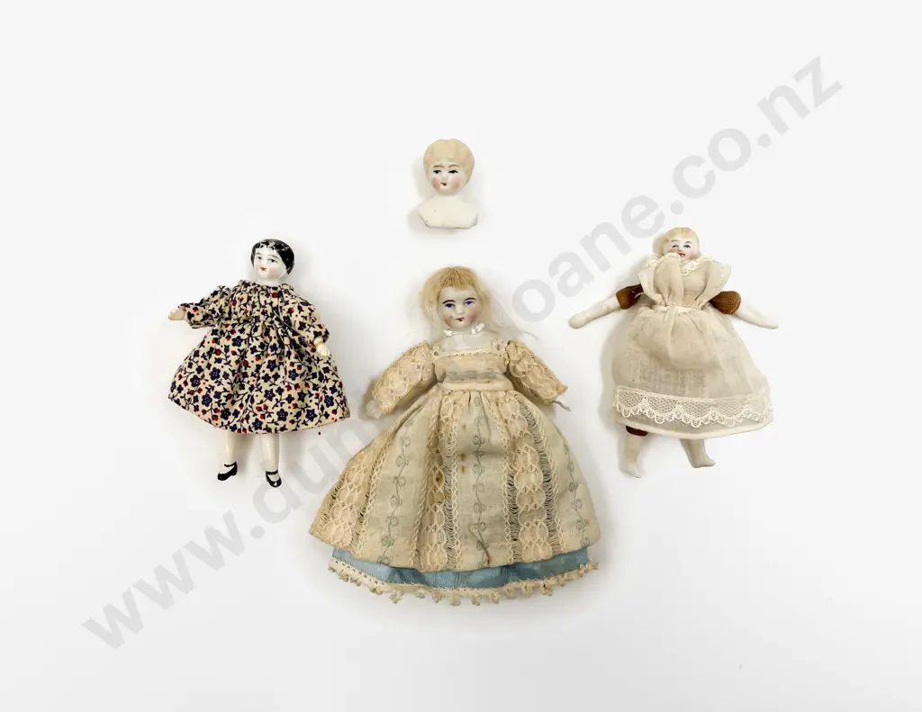 Four Small Bisque and China Shoulder Plate Dolls Image 1++