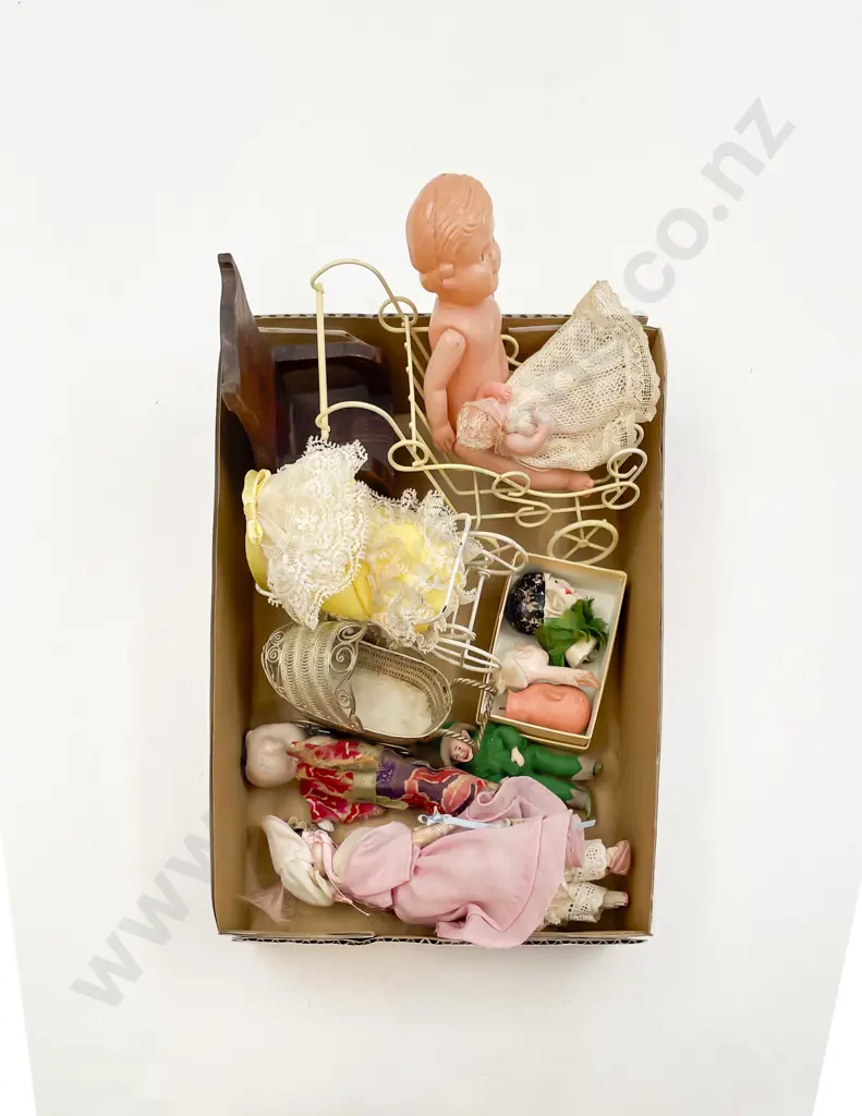 Three Assorted Small Doll Prams Image 1++