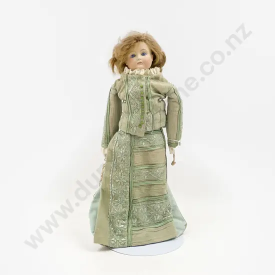 Two New Bisque Dolls