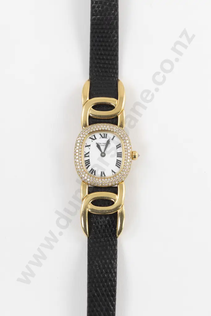 C1990's Patek Philippe 18ct and Diamond Set Golden Ellipse Quartz Ladies Wrist Watch Image 1++