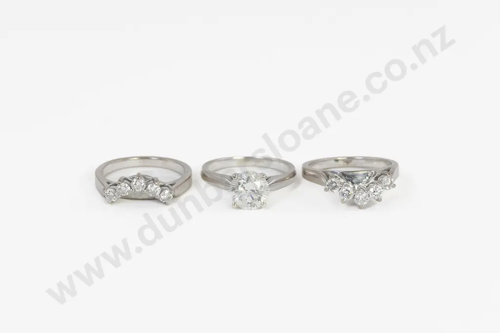 14ct White Gold Solitaire Diamond Ring with Two Curved Fitted Diamond Bands Image 1++