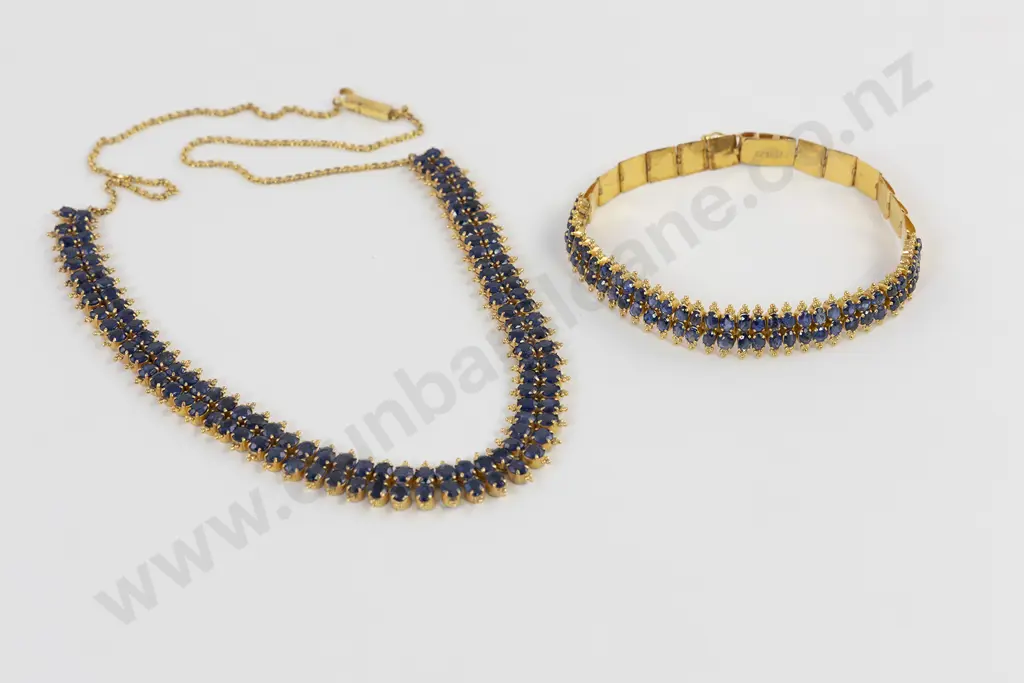 21ct 118 stone Sapphire Necklace double row all claw set oval mixed native cut dark blue sapphires approx 19.50cts tgw finished with a bead trim Image 1++