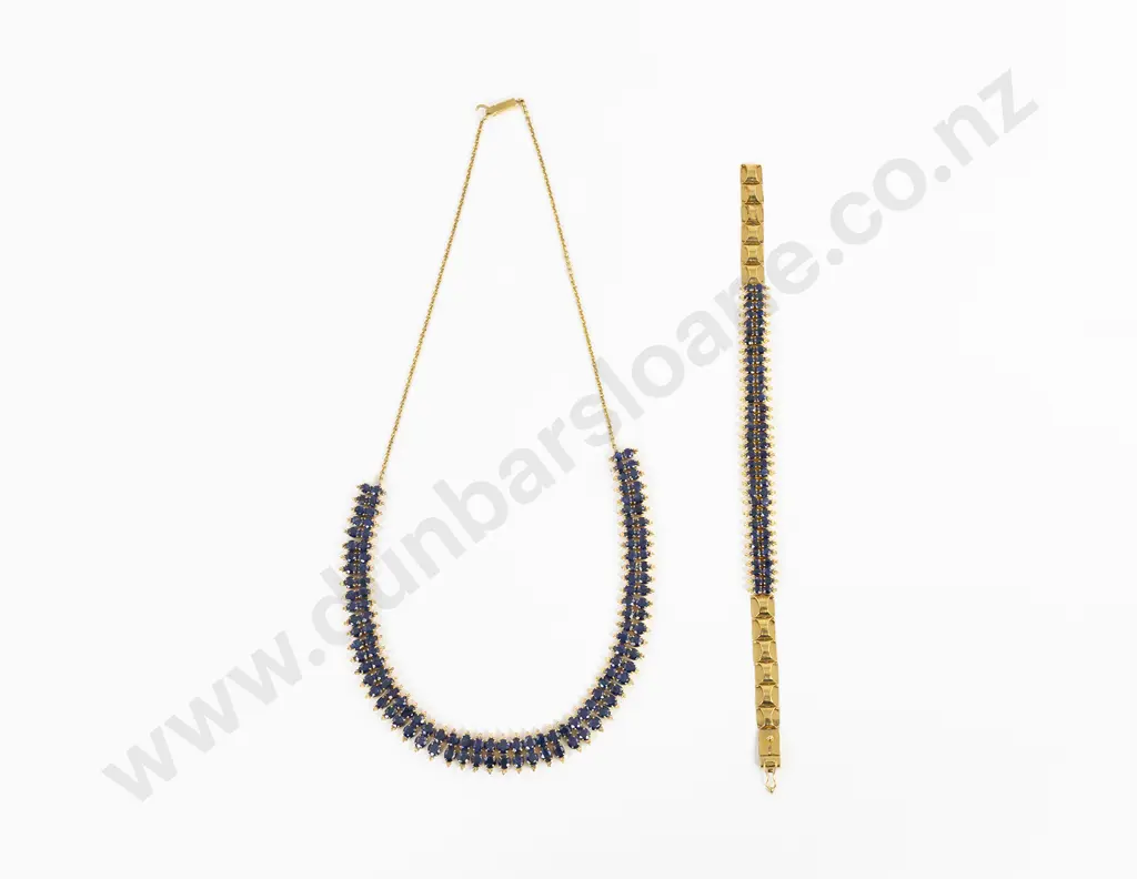 21ct 118 stone Sapphire Necklace double row all claw set oval mixed native cut dark blue sapphires approx 19.50cts tgw finished with a bead trim Image 1++