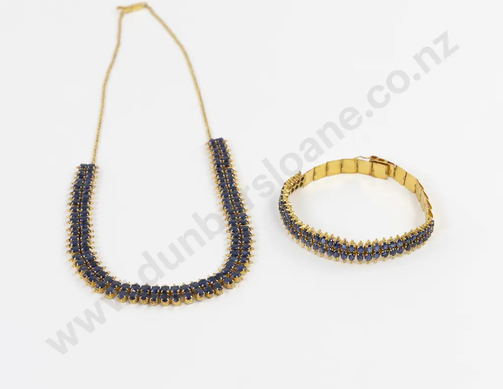 21ct 118 stone Sapphire Necklace double row all claw set oval mixed native cut dark blue sapphires approx 19.50cts tgw finished with a bead trim Image 1++