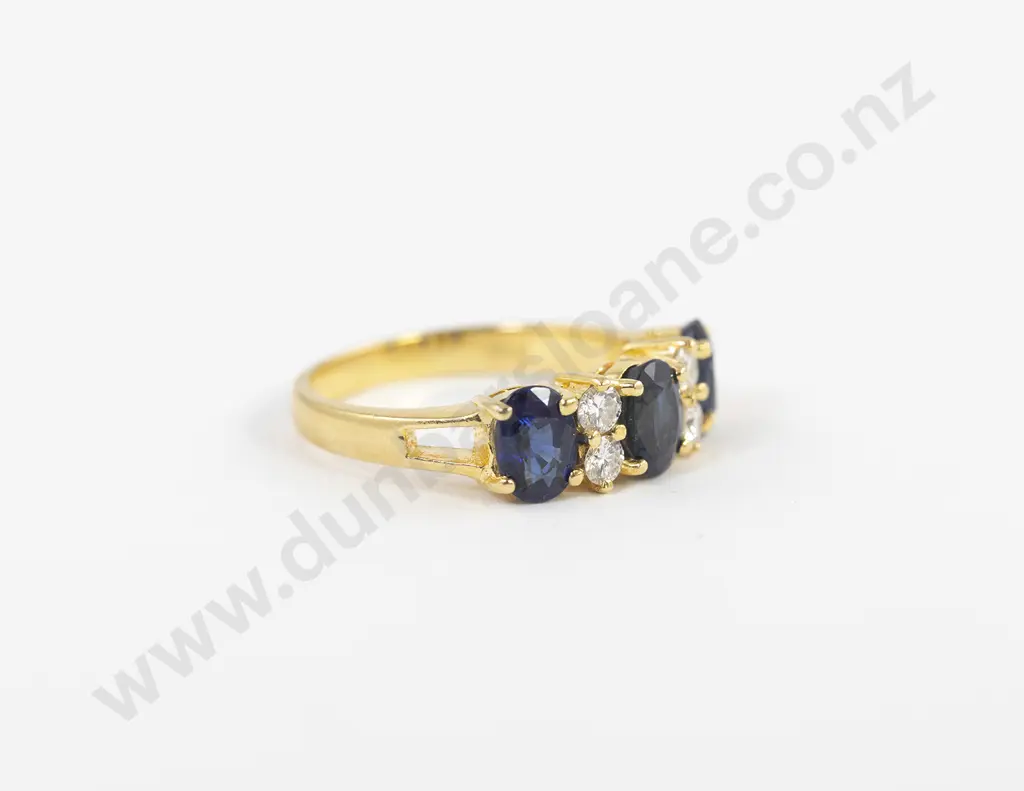 18ct Seven Stone Sapphire and Diamond Dress Ring Image 1++