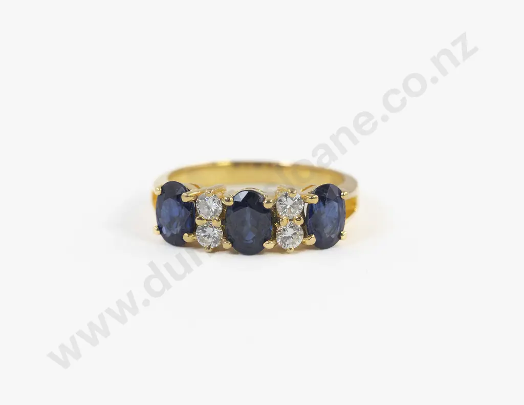 18ct Seven Stone Sapphire and Diamond Dress Ring Image 1++