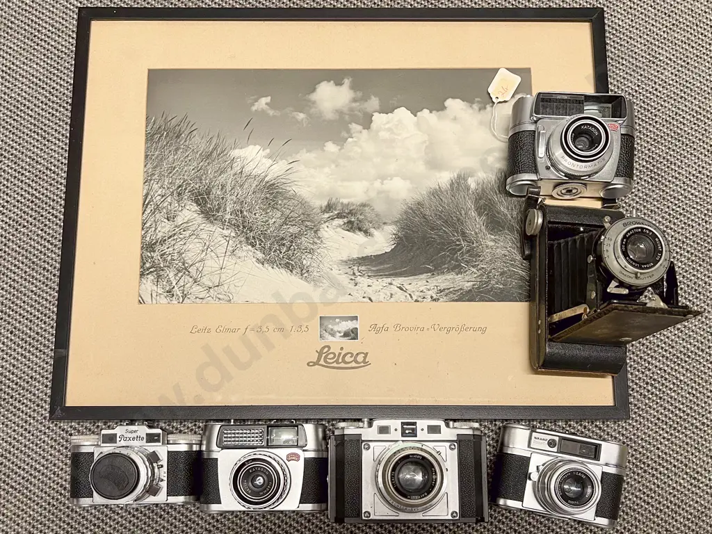 Six Vintage Assorted Cameras with Framed Leica Print Image 1++