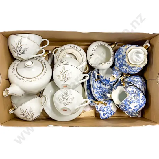 Two Toy Tea Sets