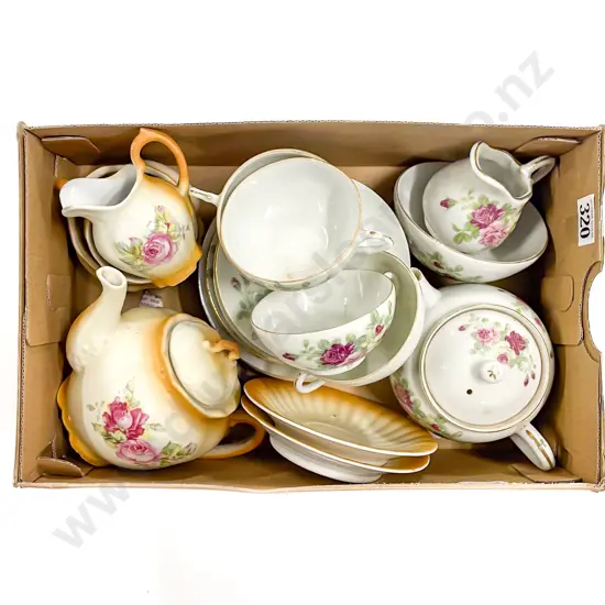 Two Toy Tea Sets