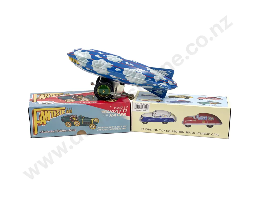 Three New Tin Plate Clockwork Toys Image 1++