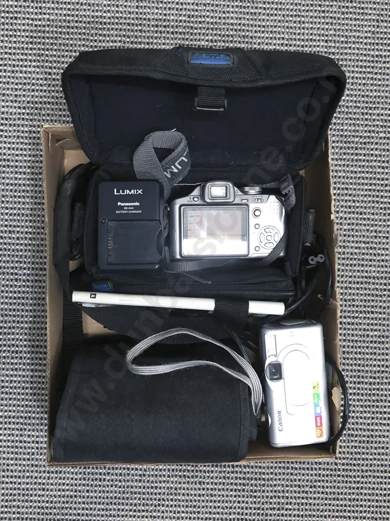 Two Cameras with Accessories Image 1++