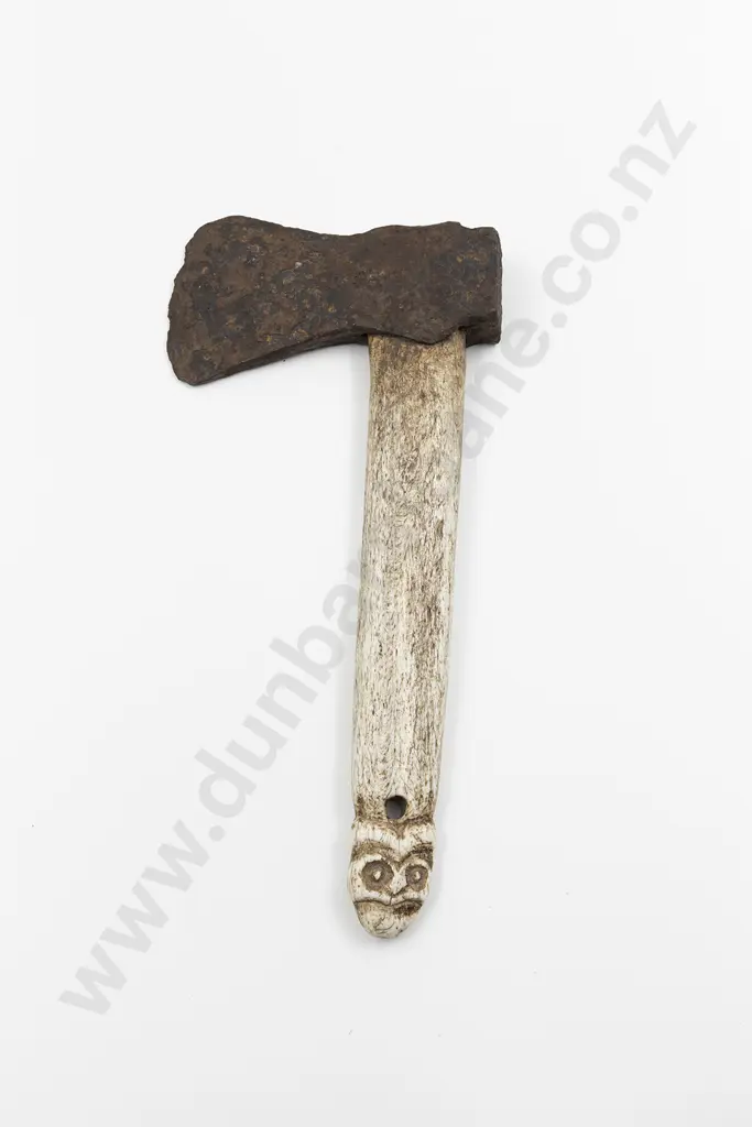 A Whalebone Patiti With A Trade Axe Head Image 1++
