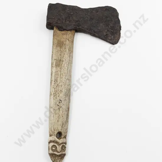 A Whalebone Patiti With A Trade Axe Head