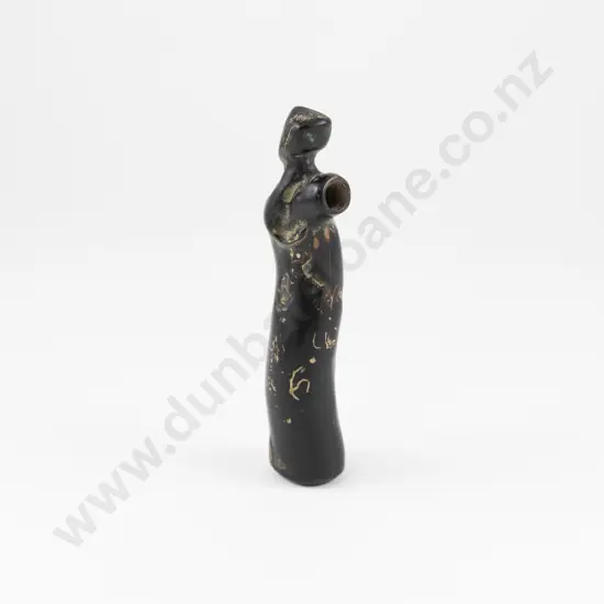 A Black Coral Nguru (Nose Flute)