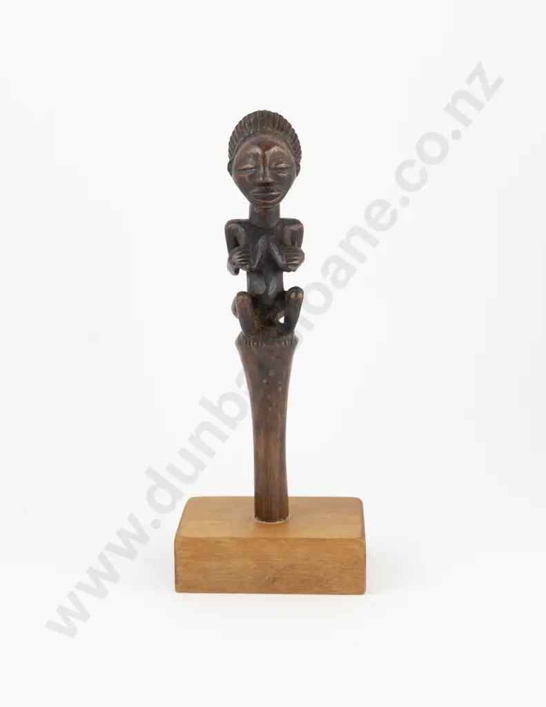 An African Fly Wisk Handle Mounted On A Wooden Base Image 1++
